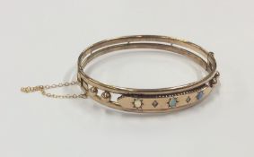 An opal and diamond hinged bangle with concealed c