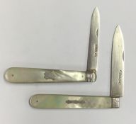 Two large silver and MOP fruit knives with vacant