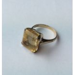 A 14 carat citrine single stone ring. Approx. 7.9