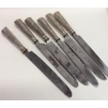 A set of six heavy Portuguese silver tapering kniv