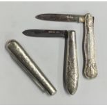 A silver fruit knife attractively decorated with f