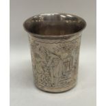 A tall Continental silver tapering beaker decorate