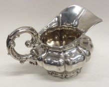 A Georgian style Continental silver cream jug in s