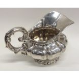 A Georgian style Continental silver cream jug in s