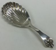 An Edwardian silver caddy spoon with fluted bowl a