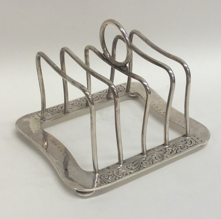 LIBERTY & CO: A rare five bar silver toast rack de