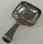 A Georgian silver bright cut caddy spoon decorated