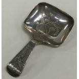 A Georgian silver bright cut caddy spoon decorated