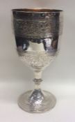 A large Victorian silver engraved goblet attractiv