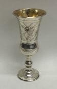 A Continental tapering silver goblet with gilt int