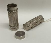 An unusual Antique silver nutmeg grater of cylindr