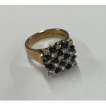 A large sapphire and diamond chequerboard ring in