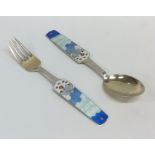 A silver and enamelled spoon and fork decorated wi