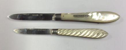A large silver and MOP fruit knife with silver bla