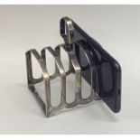 An Edwardian silver five bar toast rack / smartpho