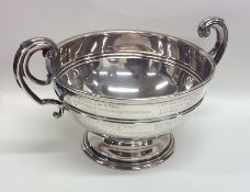 A heavy silver two handled trophy cup. Birmingham.