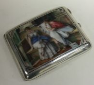 A good quality silver and enamel card case depicti