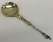 An unusual Continental silver spoon decorated with