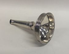 A Georgian Scottish silver wine funnel with reeded