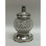 An unusual silver mounted glass sugar caster with