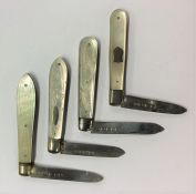 A group of four silver and MOP fruit knives. Vario