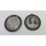 Two oval painted miniatures on ivory of ladies in