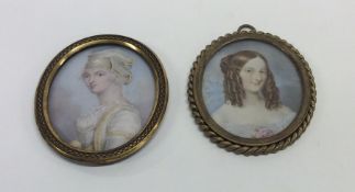 Two oval painted miniatures on ivory of ladies in