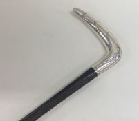 An unusual silver walking cane with textured handl
