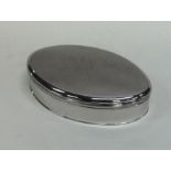 A good oval Georgian silver box with crested hinge