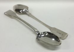 A pair of heavy Victorian silver basting spoons. L