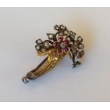 A good quality high carat gold cornucopia brooch d