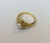 A heavy diamond and pearl gypsy ring. Approx. 6.8