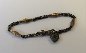 An Antique fancy link bracelet with hand clasp. Ap