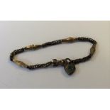 An Antique fancy link bracelet with hand clasp. Ap