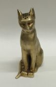 A good quality silver gilt model of a seated cat w