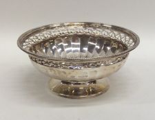 A small Edwardian silver sweet dish with panelled