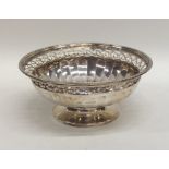 A small Edwardian silver sweet dish with panelled