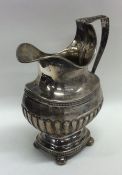 A tall Antique Dutch silver Antique cream jug of h