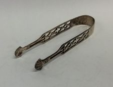 A pair of Georgian silver pierced sugar tongs. Lon