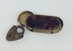 An unusual Antique tortoiseshell and brass double