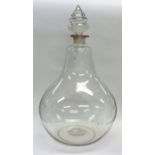 A massive glass chemist's bottle with removable st