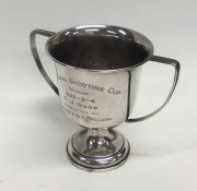 A silver shooting trophy. The Maclean shooting cup