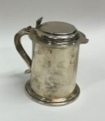 A Continental silver Georgian style tankard on spr