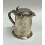 A Continental silver Georgian style tankard on spr