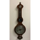 A rosewood veneered banjo barometer with silvered