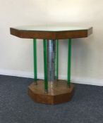 An Art Deco mirrored top occasion table with green