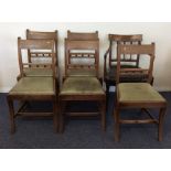A set of five Georgian dining chairs with slip-in