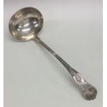 A heavy silver Kings' pattern soup ladle. London.