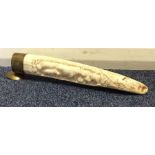 An Antique carved tusk with hippopotamus decoratio