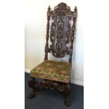 A Continental carved back hall chair. Est. £40 - £